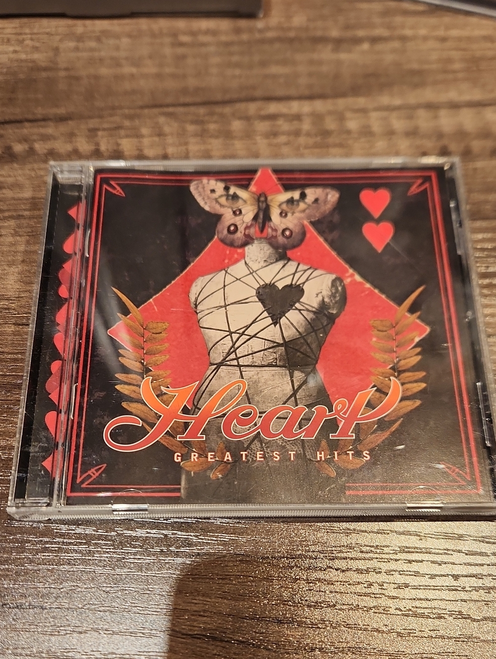 Heart Moon Star Red and Black 'Heart Greatest Hits' CD Cover Art